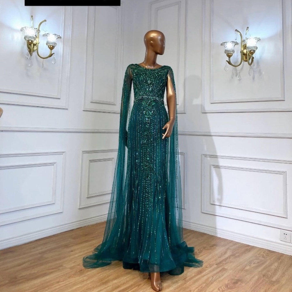 Emerald green sequin long sleeve evening gown
